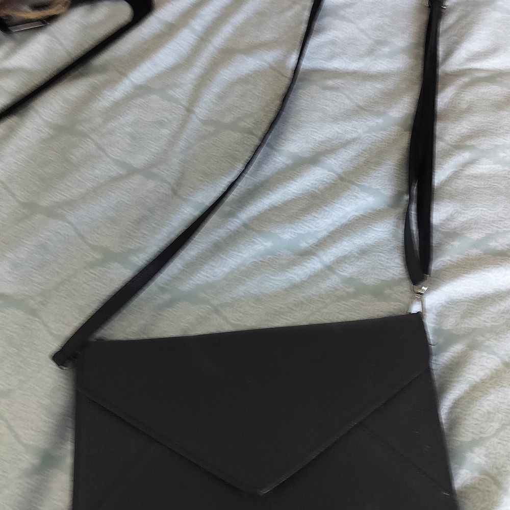 Sleek Black Crossbody Bag with Envelope Design